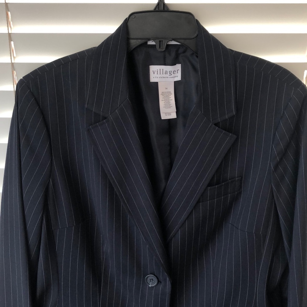 Navy pinstriped jacket with optional belt.